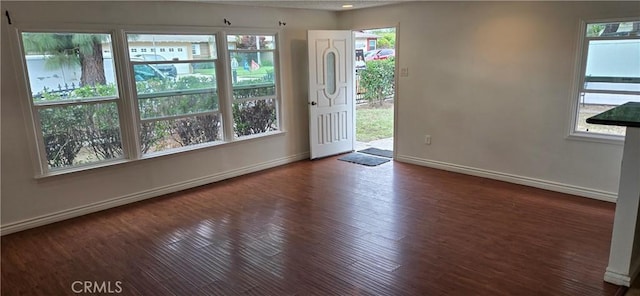 9715 La Docena Ln, Pico Rivera, CA 90660 - entrance foyer with baseboards and wood finished floors