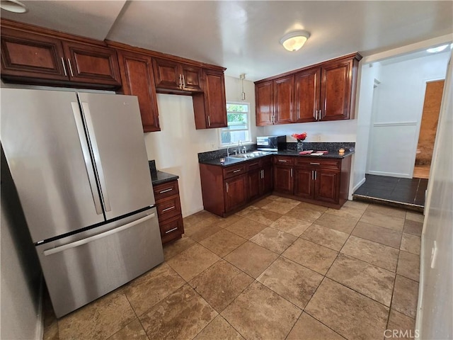 9715 La Docena Ln, Pico Rivera, CA 90660 - kitchen with stainless steel appliances and dark countertops