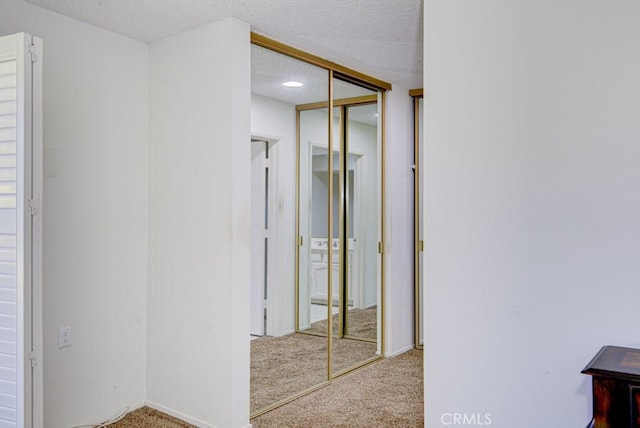 3424 Calle Azul Unit A, Laguna Woods, CA 92637 - hallway featuring carpet flooring