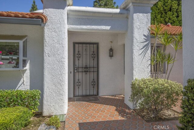 3424 Calle Azul Unit A, Laguna Woods, CA 92637 - property entrance featuring stucco siding