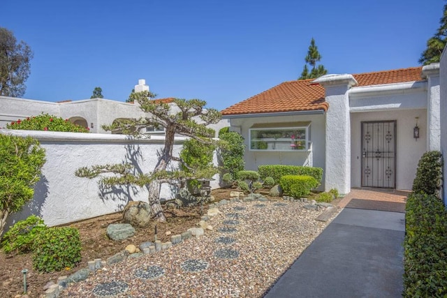 3424 Calle Azul Unit A, Laguna Woods, CA 92637 - view of front of house featuring stucco siding and a tiled roof