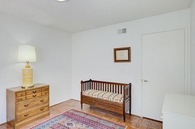 3424 Calle Azul Unit A, Laguna Woods, CA 92637 - bedroom featuring a textured ceiling