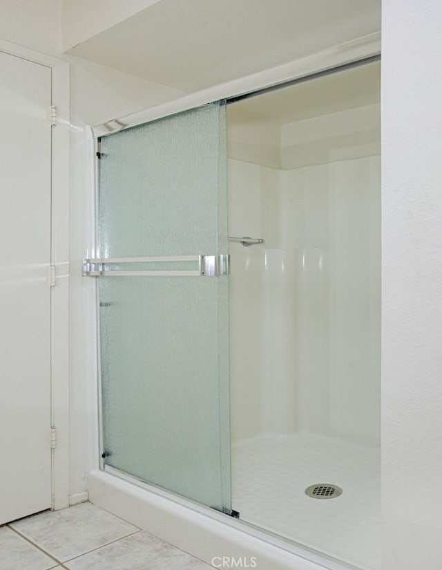3424 Calle Azul Unit A, Laguna Woods, CA 92637 - bathroom with a stall shower and tile patterned flooring