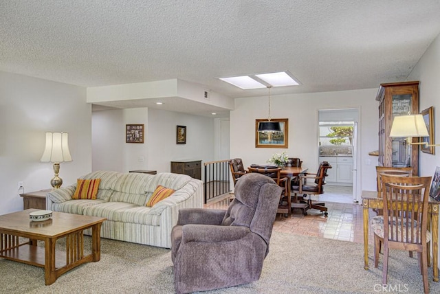 3424 Calle Azul Unit A, Laguna Woods, CA 92637 - living room featuring a textured ceiling