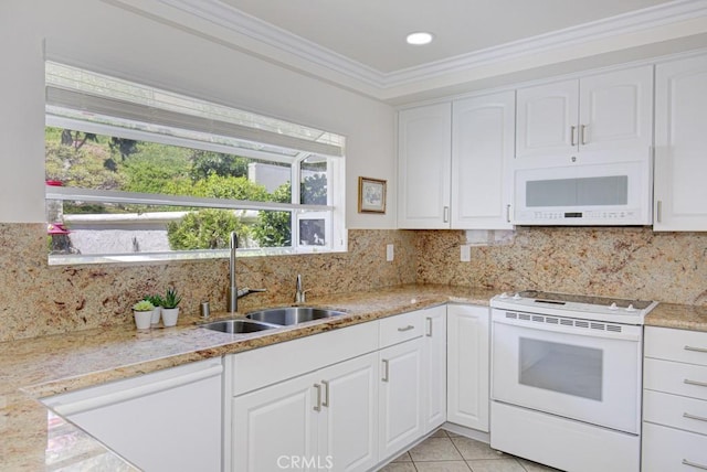 3424 Calle Azul Unit A, Laguna Woods, CA 92637 - kitchen with white appliances, a sink, white cabinetry, light stone counters, and crown molding
