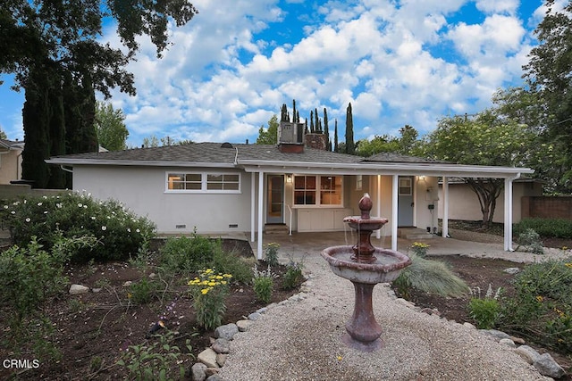6429 Creemore Ln, Tujunga, CA 91042 - view of front of home with a patio, a chimney, crawl space, and stucco siding
