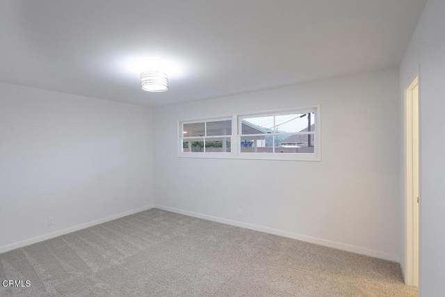 6429 Creemore Ln, Tujunga, CA 91042 - spare room featuring light colored carpet and baseboards