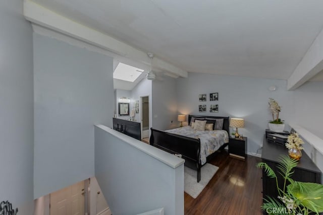 bedroom with dark wood-style flooring and a skylight