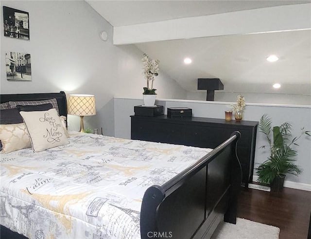 bedroom with wood finished floors, lofted ceiling, baseboards, and recessed lighting