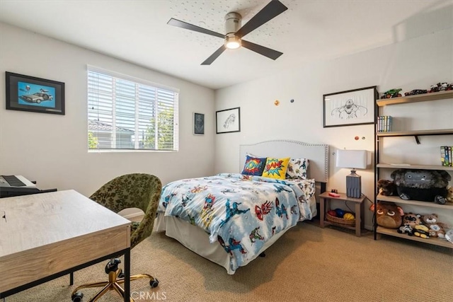 bedroom with carpet and a ceiling fan