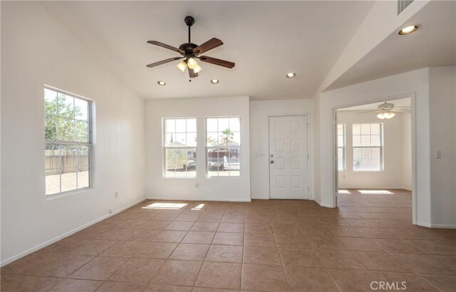 7728 Balsa Ave, Yucca Valley, CA 92284 - empty room with lofted ceiling, healthy amount of natural light, a ceiling fan, baseboards, and recessed lighting