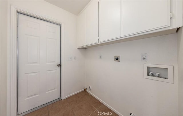 7728 Balsa Ave, Yucca Valley, CA 92284 - washroom featuring cabinet space, hookup for a washing machine, baseboards, hookup for an electric dryer, and tile patterned flooring
