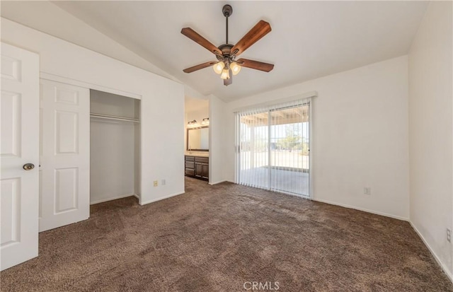 7728 Balsa Ave, Yucca Valley, CA 92284 - unfurnished bedroom with carpet flooring, vaulted ceiling, ensuite bath, a closet, and baseboards