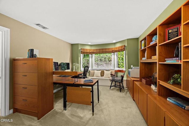 office area with light colored carpet