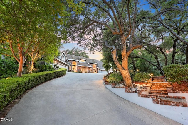view of front of house featuring driveway and a garage