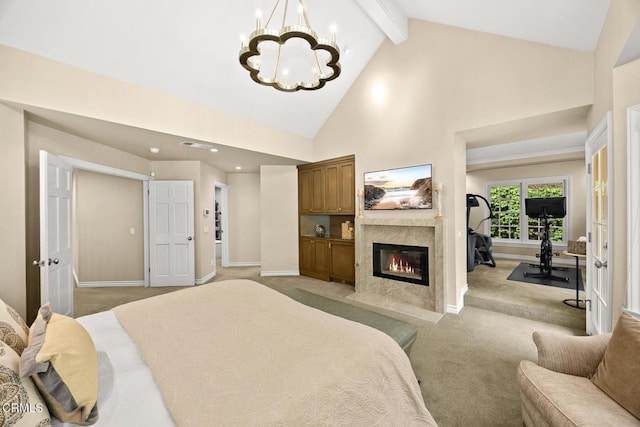 bedroom with light carpet, a chandelier, baseboards, a fireplace, and high vaulted ceiling