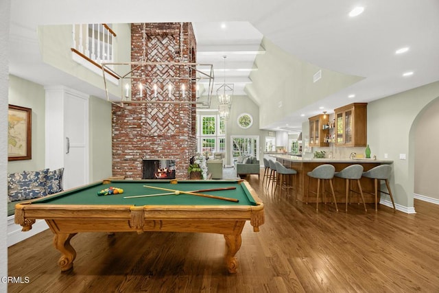 rec room with baseboards, a fireplace, wood finished floors, billiards, and recessed lighting