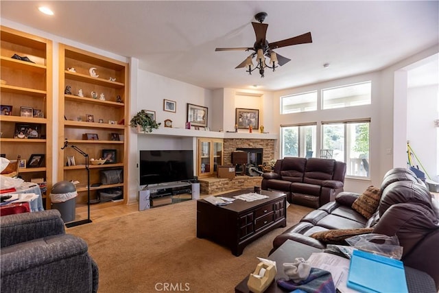 33220 Wilson St, Wildomar, CA 92595 - living area with carpet floors, ceiling fan, built in features, and a fireplace