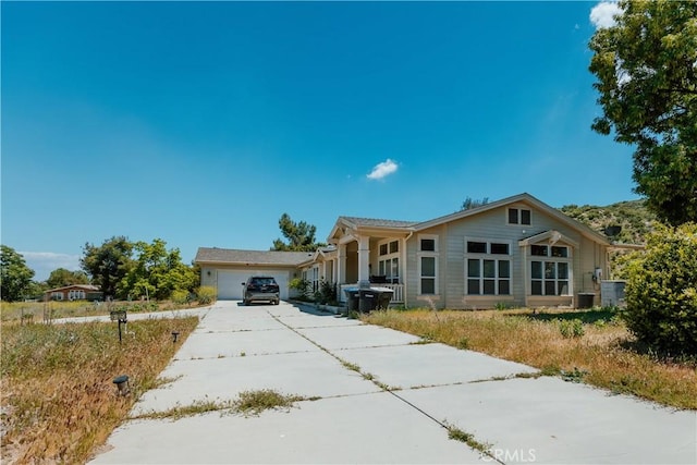 33220 Wilson St, Wildomar, CA 92595 - ranch-style house with concrete driveway and a garage
