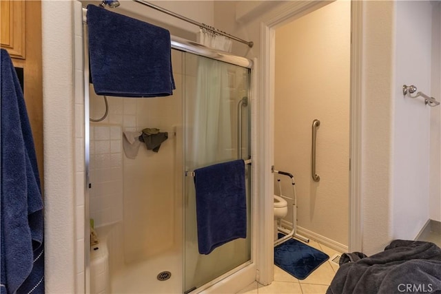33220 Wilson St, Wildomar, CA 92595 - full bath with a shower stall, tile patterned flooring, and toilet