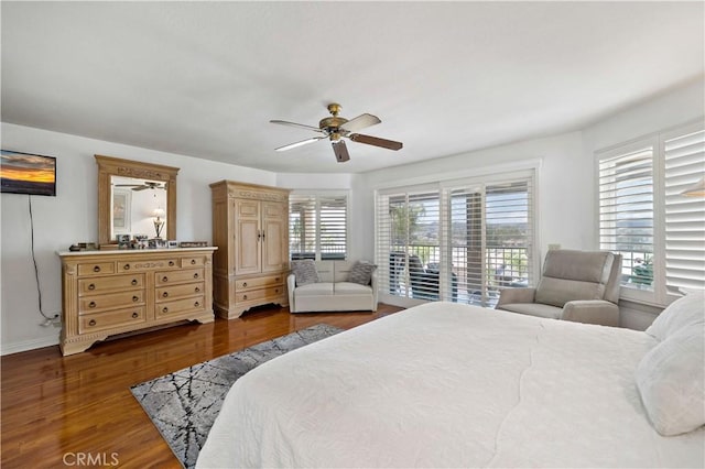 22299 San Joaquin Dr W, Canyon Lake, CA 92587 - bedroom with multiple windows, wood finished floors, ceiling fan, and baseboards
