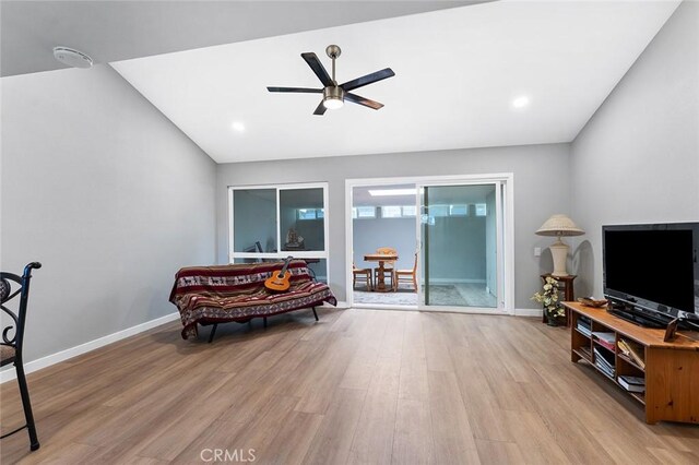 3660 Vista Campana N Unit 11, Oceanside, CA 92057 - sitting room with light wood finished floors, a ceiling fan, baseboards, lofted ceiling, and recessed lighting