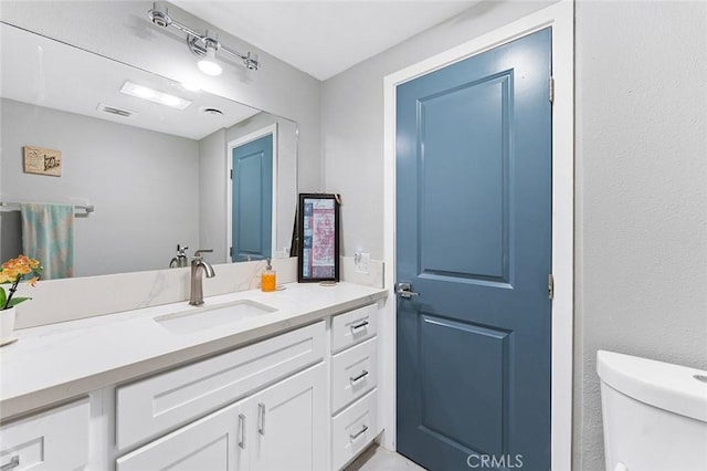 3660 Vista Campana N Unit 11, Oceanside, CA 92057 - bathroom with toilet and vanity