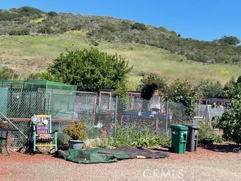 3660 Vista Campana N Unit 11, Oceanside, CA 92057 - view of yard with fence and a mountain view