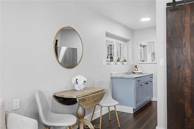 555 E Branch St, Arroyo Grande, CA 93420 - bathroom featuring wood finished floors, baseboards, and vanity