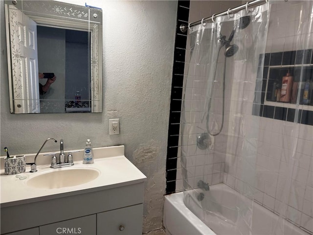 12145 Wanda St, El Monte, CA 91732 - full bath with a textured wall, vanity, and shower / bathtub combination with curtain