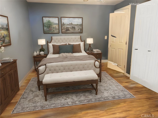 12145 Wanda St, El Monte, CA 91732 - bedroom with light wood finished floors and baseboards