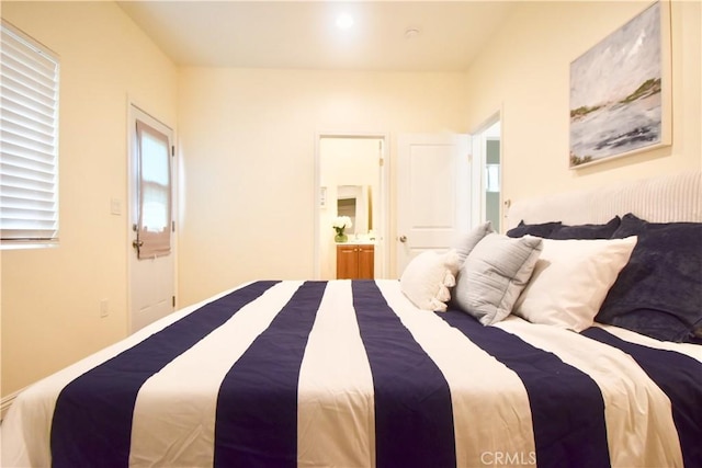 bedroom featuring ensuite bathroom