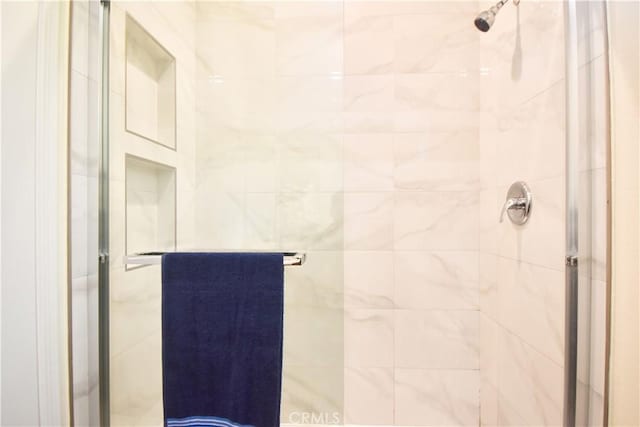 full bathroom featuring a stall shower