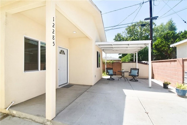 view of patio with fence