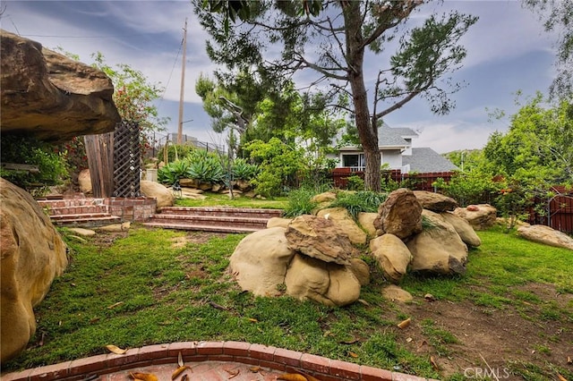 view of yard with fence