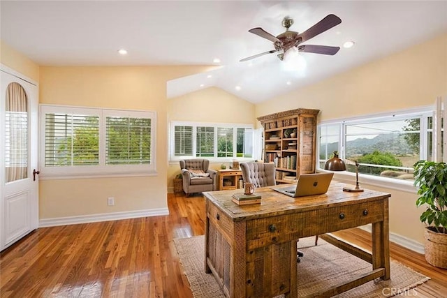 office area with plenty of natural light, lofted ceiling, ceiling fan, baseboards, and recessed lighting