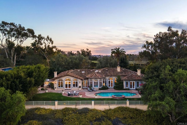 8374 St Andrews Rd, Rancho Santa Fe, CA 92067 - rear view of property with a patio, a chimney, french doors, and a tile roof