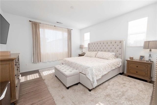 3225 E Denali Dr, Ontario, CA 91762 - bedroom featuring wood finished floors and baseboards