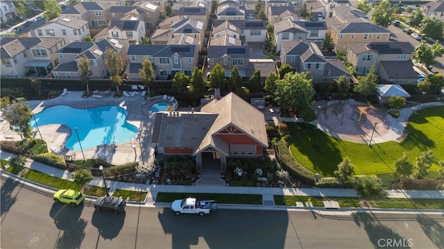 3225 E Denali Dr, Ontario, CA 91762 - aerial overview of property's location with a pool area and nearby suburban area