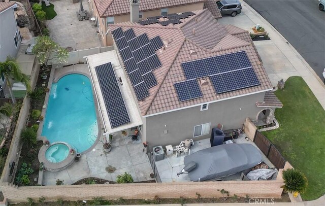 view from above of property featuring a pool area