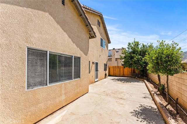 16129 Windcrest Dr, Fontana, CA 92337 - view of patio / terrace featuring a fenced backyard