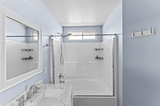 16129 Windcrest Dr, Fontana, CA 92337 - full bathroom with a textured wall, shower / bathtub combination, a textured ceiling, and vanity
