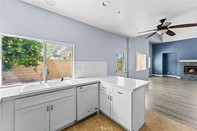 16129 Windcrest Dr, Fontana, CA 92337 - kitchen featuring dishwasher, a sink, plenty of natural light, and a ceiling fan
