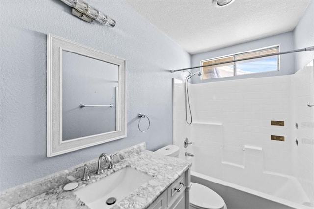 16129 Windcrest Dr, Fontana, CA 92337 - full bath featuring toilet, a textured wall, a textured ceiling, vanity, and bathtub / shower combination