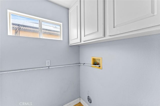 16129 Windcrest Dr, Fontana, CA 92337 - laundry room with cabinet space, hookup for a washing machine, and baseboards