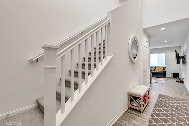 7354 Freesia Ln, Chino, CA 91708 - stairs featuring recessed lighting and wood finished floors