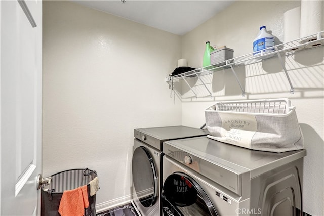 7354 Freesia Ln, Chino, CA 91708 - laundry room featuring separate washer and dryer and baseboards