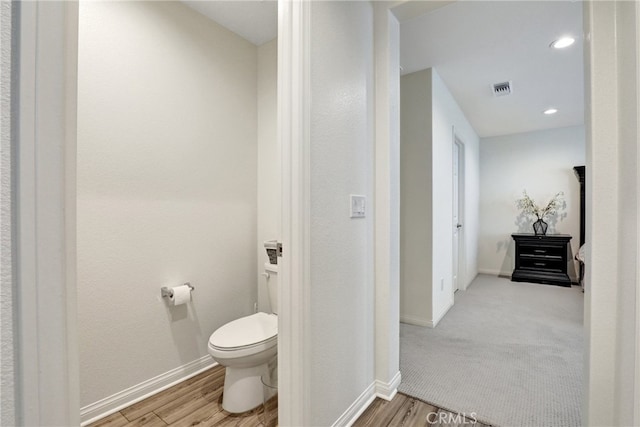 7354 Freesia Ln, Chino, CA 91708 - bathroom with wood finished floors and recessed lighting