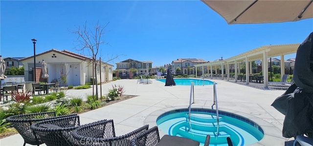 7354 Freesia Ln, Chino, CA 91708 - community pool with a community hot tub, a patio area, and a residential view