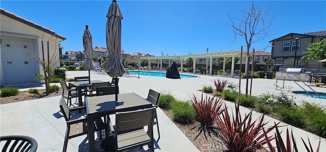 7354 Freesia Ln, Chino, CA 91708 - community pool with a patio, a residential view, and outdoor dining space